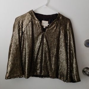 Gold sequined jacket will spice up your look!